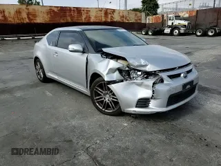 2013 Scion tC z VIN JTKJF5C70D3045008, wystawiony jako Copart lot #58628614 z przebiegiem 130 739 mil mil oraz Szkody całkowita. Historia ofert i sprzedaży dostępna na DreamBid. Obrazek 10.