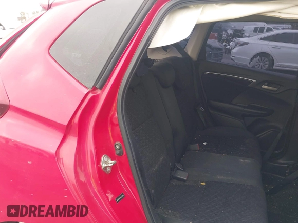 2015 Honda Fit LX with VIN 3HGGK5H5XFM775385, listed as a IAAI auction lot 42555319 with 81,615 mi miles and . Bid and sale history available at DreamBid. Image 8.