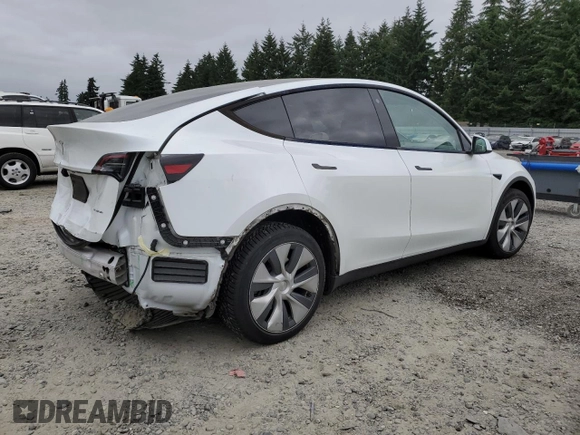 2023 Tesla Model Y Long Range z VIN 7SAYGDEE9PA081604, wystawiony jako Copart lot #60163785 z przebiegiem 42 134 mil mil oraz Szkoda całkowita • Salvage title. Historia ofert i sprzedaży dostępna na DreamBid. Obrazek 3.