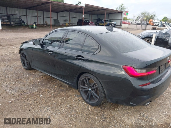 2019 BMW 3 Series 330i with VIN WBA5R1C51KAE82094, listed as a IAAI auction lot 39040815 with 66,344 mi miles and . Bid and sale history available at DreamBid. Image 3.
