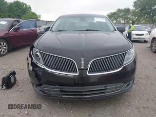 2013 Lincoln MKS z VIN 1LNHL9EK0DG600129, wystawiony jako IAAI lot #42314913 z przebiegiem 119 674 mil mil oraz . Historia ofert i sprzedaży dostępna na DreamBid. Obrazek 13.