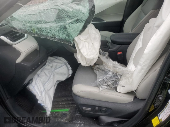 2024 Toyota RAV4 Hybrid XLE Premium z VIN 4T3B6RFVXRU173774, wystawiony jako Copart lot #57258085 z przebiegiem Nie podano mil oraz Szkoda całkowita • Salvage title. Historia ofert i sprzedaży dostępna na DreamBid. Obrazek 7.