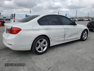 2015 BMW 3 Series 328i with VIN WBA3C1C55FK120405, listed as a Copart auction lot 54374035 with 121,411 mi miles and Salvage title. Bid and sale history available at DreamBid. Image 3.