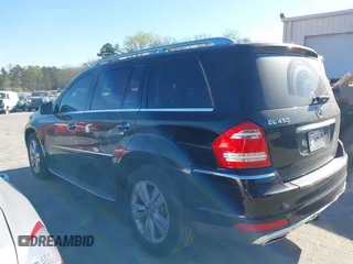 2012 Mercedes-Benz GL-Class GL 450 with VIN 4JGBF7BE2CA795653, listed as a IAAI auction lot 41847301 with 144,137 mi miles. Bid and sale history available at carsss.com. Image 14.