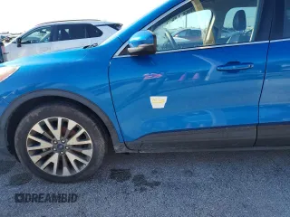 2020 Ford Escape Titanium z VIN 1FMCU9J95LUA37315, wystawiony jako Copart lot #58873545 z przebiegiem Nie podano mil oraz Szkoda całkowita • Salvage title. Historia ofert i sprzedaży dostępna na DreamBid. Obrazek 13.
