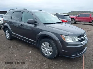 2017 Dodge Journey SE with VIN 3C4PDCAB9HT603595, listed as a IAAI auction lot 41914690 with 104,960 mi miles and . Bid and sale history available at carsss.com. Image 1.