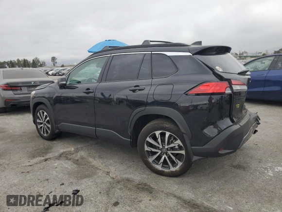 2024 Toyota Corolla Cross XLE with VIN 7MUDAAAG8RV095021, listed as a Copart auction lot 59232265 with 7,010 mi miles and Salvage title. Bid and sale history available at DreamBid. Image 2.