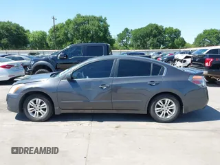 2012 Nissan Altima 2.5 with VIN 1N4AL2AP0CN566515, listed as a IAAI auction lot 41977356 with 294,729 mi miles and . Bid and sale history available at DreamBid. Image 14.