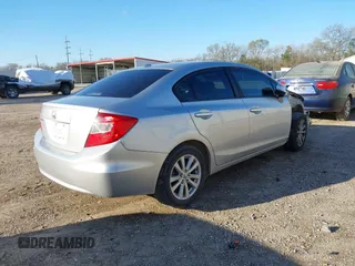 2012 Honda Civic EX-L with VIN 19XFB2F99CE047996, listed as a IAAI auction lot 41596688 with 124,523 mi miles and . Bid and sale history available at DreamBid. Image 4.