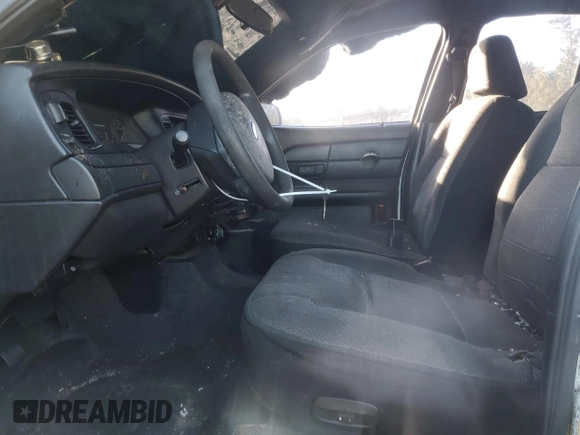 2006 Ford Police Interceptor with VIN 2FAFP71W06X165970, listed as a Copart auction lot 76293344 with 180,661 mi miles and Salvage title. Bid and sale history available at DreamBid. Image 7.