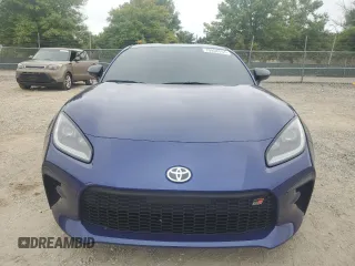 2023 Toyota GR86 with VIN JF1ZNBB19P9758747, listed as a Copart auction lot 70958554 with 22,573 mi miles and Salvage Title. Bid and sale history available at carsss.com. Image 5.