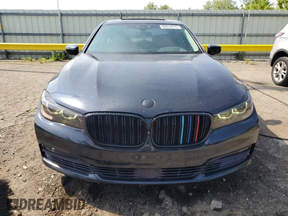 2016 BMW 7 Series 740i with VIN WBA7E2C56GG738788, listed as a Copart auction lot 60654015 with 96,059 mi miles and Clean title. Bid and sale history available at DreamBid. Image 5.