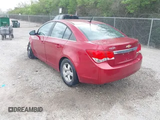 2014 Chevrolet Cruze 1LT with VIN 1G1PC5SB2E7357639, listed as a IAAI auction lot 42129404 with 154,174 mi miles and . Bid and sale history available at DreamBid. Image 3.
