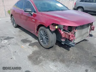 2019 Toyota Avalon Hybrid Limited with VIN 4T1B21FB4KU009762, listed as a IAAI auction lot 41707299 with 156,143 mi miles. Bid and sale history available at carsss.com. Image 1.