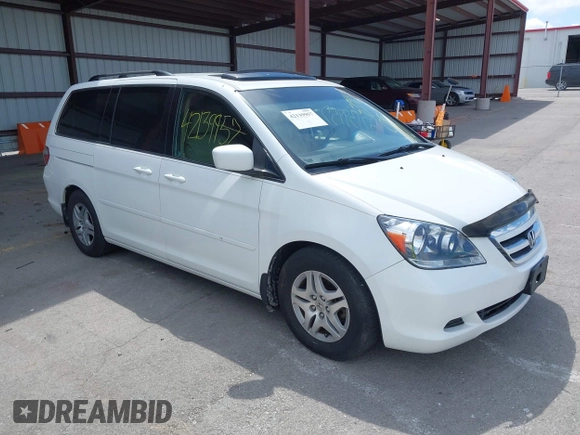 2007 Honda Odyssey EX-L with VIN 5FNRL38787B144585, listed as a IAAI auction lot 42139957 with 211,412 mi miles and . Bid and sale history available at DreamBid. Image 1.