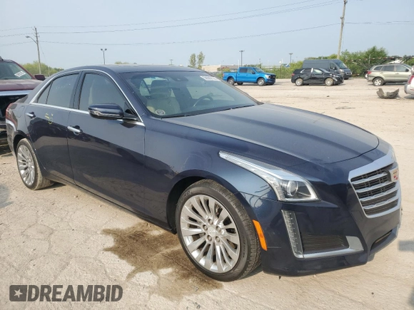 2017 Cadillac CTS Luxury AWD with VIN 1G6AX5SX7H0141380, listed as a Copart auction lot 58999135 with 91,003 mi miles and Salvage title. Bid and sale history available at DreamBid. Image 4.