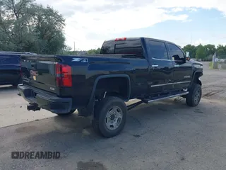 2015 GMC Sierra 2500HD SLT with VIN 1GT12ZE87FF552599, listed as a IAAI auction lot 40054977 with 146,190 mi miles and . Bid and sale history available at DreamBid. Image 4.