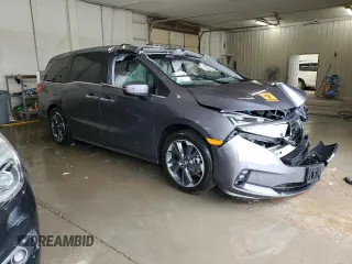 2023 Honda Odyssey Elite with VIN 5FNRL6H98PB056770, listed as a Copart auction lot 56984055 with Not provided miles and Salvage title. Bid and sale history available at DreamBid. Image 4.