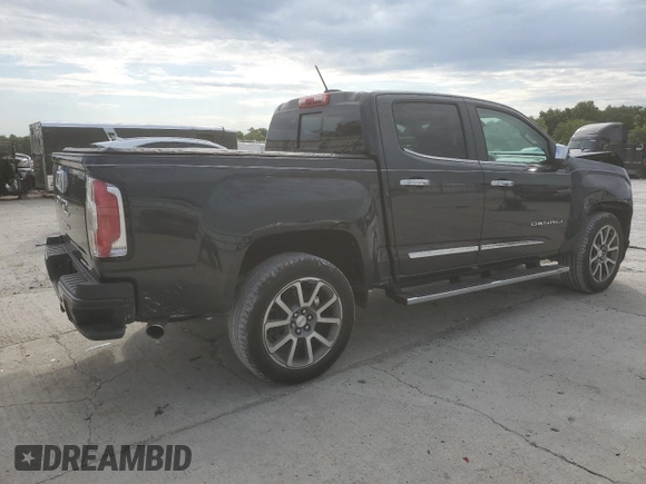 2021 GMC Canyon 4WD Denali with VIN 1GTG6EEN0M1113347, listed as a Copart auction lot 66954794 with 15,767 mi miles and Salvage Title. Bid and sale history available at carsss.com. Image 3.
