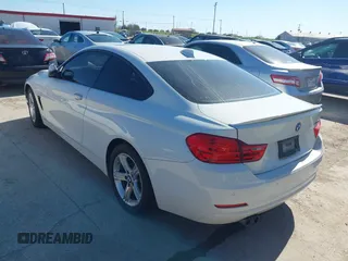 2014 BMW 4 Series 428i xDrive with VIN WBA3N9C58EF721369, listed as a IAAI auction lot 41768891 with 181,068 mi miles and . Bid and sale history available at DreamBid. Image 3.