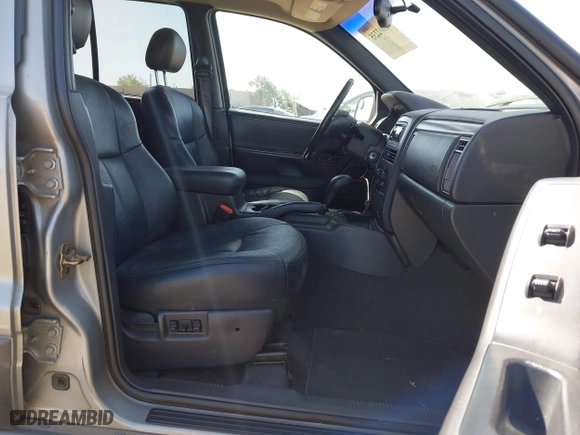 2001 Jeep Grand Cherokee Laredo with VIN 1J4GW48S61C662315, listed as a IAAI auction lot 42002235 with 166,901 mi miles. Bid and sale history available at carsss.com. Image 5.