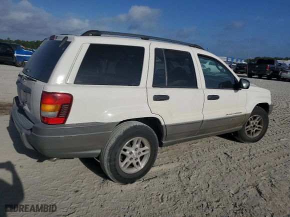 2002 Jeep Grand Cherokee Laredo with VIN 1J4GW48S12C312348, listed as a Copart auction lot 51786715 with 229,698 mi miles and Clean Title. Bid and sale history available at carsss.com. Image 3.