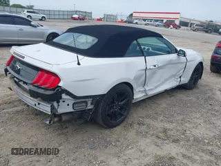 2020 Ford Mustang EcoBoost with VIN 1FATP8UH2L5119009, listed as a IAAI auction lot 42251261 with 80,725 mi miles and . Bid and sale history available at DreamBid. Image 4.