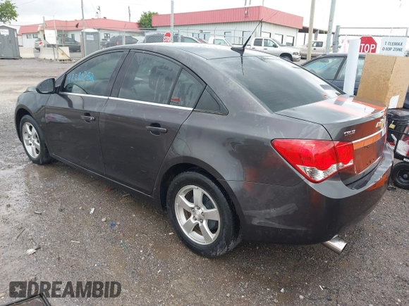 2014 Chevrolet Cruze 1LT z VIN 1G1PC5SBXE7336621, wystawiony jako IAAI lot #42290252 z przebiegiem 184 453 mil mil oraz . Historia ofert i sprzedaży dostępna na DreamBid. Obrazek 3.