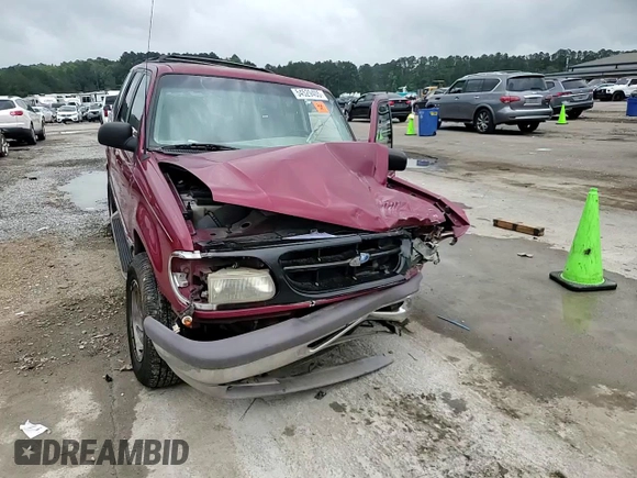 1996 Ford Explorer XL z VIN 1FMDU32X5TUD14799, wystawiony jako Copart lot #54529405 z przebiegiem 195 730 mil mil oraz Szkoda całkowita • Salvage title. Historia ofert i sprzedaży dostępna na DreamBid. Obrazek 14.