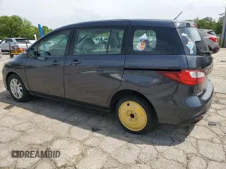 2015 Mazda 5 Sport с VIN JM1CW2BL4F0184530, выставлен на аукционе Copart как лот 56965755 с пробегом 144 873 миль миль и Списание • Salvage title. История ставок и продаж доступна на DreamBid. Изображение 2.
