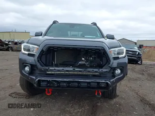 2021 Toyota Tacoma 4WD SR with VIN 3TMCZ5AN2MM406293, listed as a IAAI auction lot 41925585 with 52,243 mi miles. Bid and sale history available at carsss.com. Image 12.