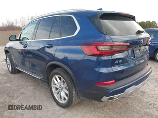 2021 BMW X5 xDrive45e with VIN 5UXTA6C07M9F32034, listed as a IAAI auction lot 41832720 with 28,453 mi miles. Bid and sale history available at carsss.com. Image 3.
