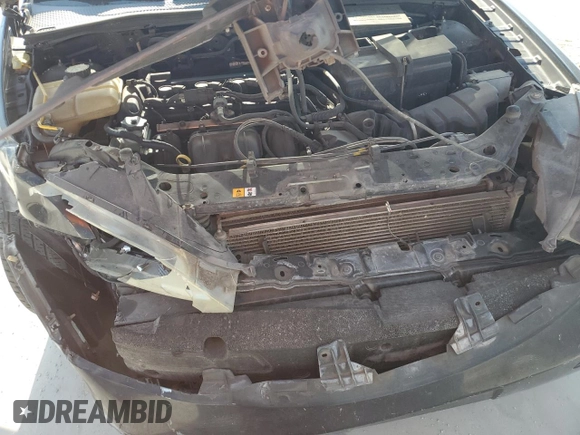 2006 Ford Focus S z VIN 1FAHP37N36W176473, wystawiony jako Copart lot #53781985 z przebiegiem 154 954 mil mil oraz Szkoda całkowita • Salvage title. Historia ofert i sprzedaży dostępna na DreamBid. Obrazek 11.