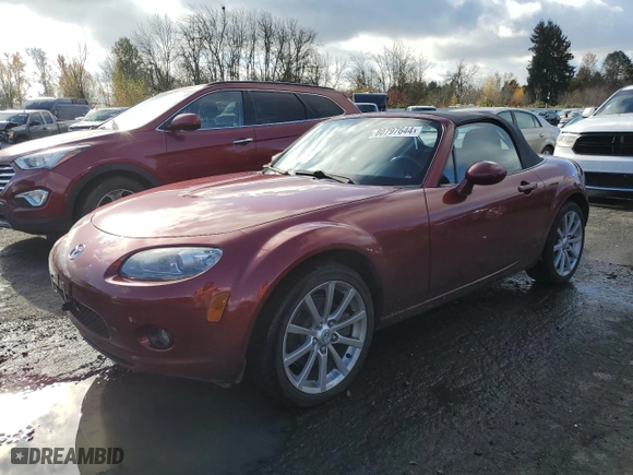 2006 Mazda MX-5 Miata Touring with VIN JM1NC25F260116122, listed as a Copart auction lot 80797644 with NaN miles and Salvage Title. Bid and sale history available at carsss.com. Image 1.