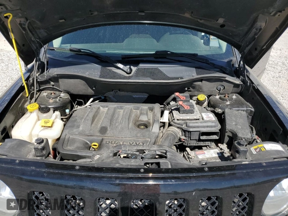 2015 Jeep Patriot Latitude with VIN 1C4NJPFB3FD377959, listed as a Copart auction lot 57914755 with 106,704 mi miles and Salvage title. Bid and sale history available at DreamBid. Image 12.