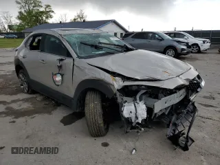 2024 Mazda CX-30 S Premium with VIN 3MVDMBDM3RM695033, listed as a Copart auction lot 52922055 with 15,996 mi miles and Salvage title. Bid and sale history available at DreamBid. Image 4.