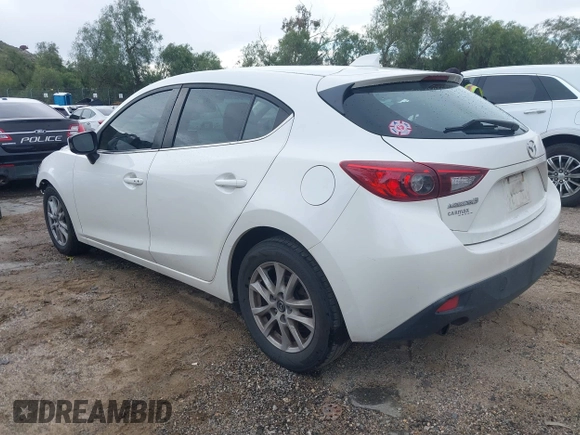 2014 Mazda 3 i Grand Touring with VIN JM1BM1M78E1208462, listed as a IAAI auction lot 41774218 with 82,781 mi miles and . Bid and sale history available at DreamBid. Image 3.
