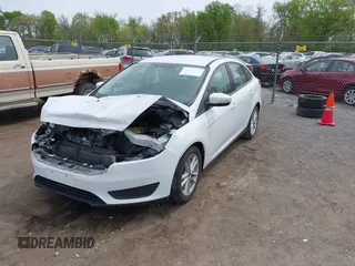 2016 Ford Focus SE with VIN 1FADP3F21GL403121, listed as a IAAI auction lot 42130743 with 103,592 mi miles and . Bid and sale history available at DreamBid. Image 17.