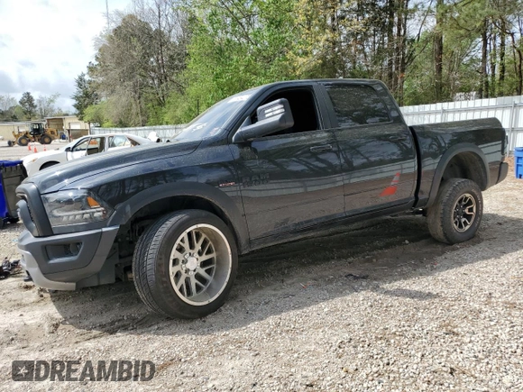 2015 Ram 1500 Rebel z VIN 1C6RR7YT3FS780133, wystawiony jako Copart lot #51484275 z przebiegiem 127 543 mil mil oraz Szkoda całkowita • Salvage title. Historia ofert i sprzedaży dostępna na DreamBid. Obrazek 1.
