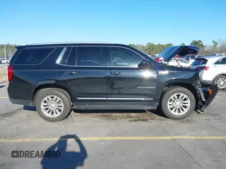 2021 GMC Yukon SLT with VIN 1GKS1BKD0MR199154, listed as a IAAI auction lot 41654239 with 105,357 mi miles. Bid and sale history available at carsss.com. Image 13.