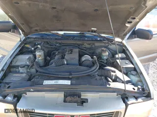 2001 GMC Sonoma SLS w/1SE Pkg with VIN 1GTCS14541K105360, listed as a IAAI auction lot 41917527 with 155,414 mi miles. Bid and sale history available at carsss.com. Image 10.