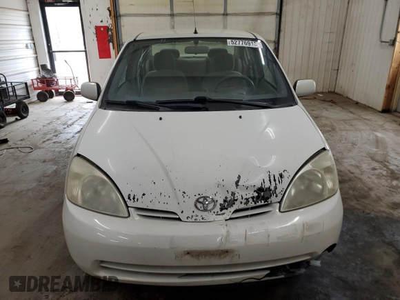 2003 Toyota Prius z VIN JT2BK18U530079842, wystawiony jako Copart lot #52776915 z przebiegiem 223 077 mil mil oraz Szkoda całkowita • Salvage title. Historia ofert i sprzedaży dostępna na DreamBid. Obrazek 5.