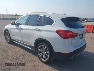 2016 BMW X1 xDrive28i z VIN WBXHT3Z37G4A48242, wystawiony jako IAAI lot #42473404 z przebiegiem 34 309 mil mil oraz . Historia ofert i sprzedaży dostępna na DreamBid. Obrazek 3.