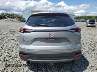 2022 Mazda CX-9 Touring z VIN JM3TCBCY6N0618360, wystawiony jako Copart lot #58356635 z przebiegiem 36 606 mil mil oraz Szkoda całkowita • Salvage title. Historia ofert i sprzedaży dostępna na DreamBid. Obrazek 6.