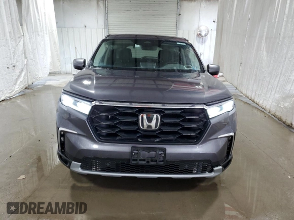 2023 Honda Pilot EX-L z VIN 5FNYG1H40PB034589, wystawiony jako Copart lot #56210485 z przebiegiem 42 181 mil mil oraz Czysty tytuł • Clean title. Historia ofert i sprzedaży dostępna na DreamBid. Obrazek 5.