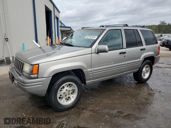 1997 Jeep Grand Cherokee Limited with VIN 1J4GZ78Y0VC682949, listed as a Copart auction lot 82152424 with 194,576 mi miles and Salvage Title. Bid and sale history available at carsss.com. Image 1.