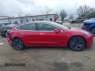 2018 Tesla Model 3 Long Range Battery with VIN 5YJ3E1EB3JF129772, listed as a IAAI auction lot 42017305 with 103,825 mi miles and . Bid and sale history available at DreamBid. Image 12.