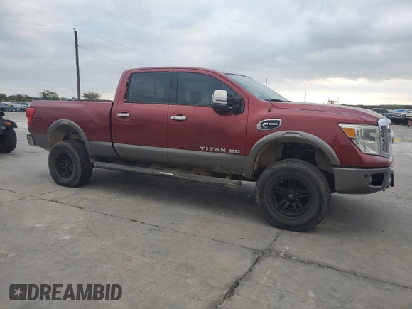 2016 Nissan Titan XD PRO-4X with VIN 1N6BA1F45GN500008, listed as a Copart auction lot 77282724 with 119,868 mi miles and Clean Title. Bid and sale history available at carsss.com. Image 4.
