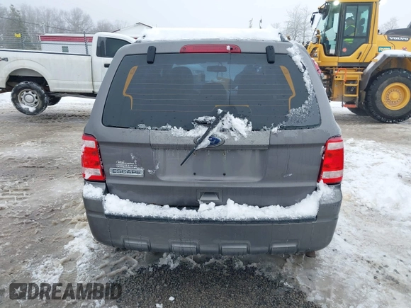 2012 Ford Escape XLS z VIN 1FMCU9C72CKA10130, wystawiony jako IAAI lot #41543233 z przebiegiem 168 552 mil mil oraz . Historia ofert i sprzedaży dostępna na DreamBid. Obrazek 16.