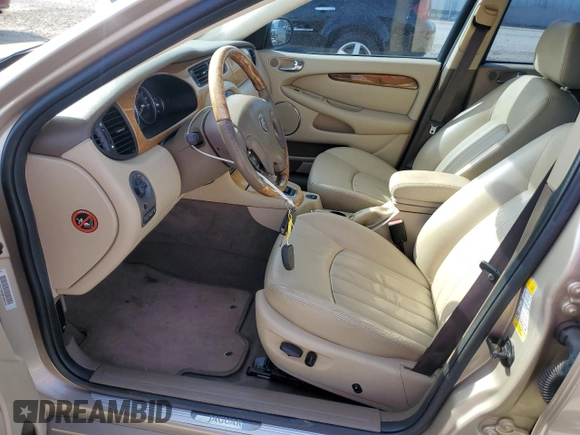 2004 Jaguar X-Type with VIN SAJEA51C64WD66013, listed as a Copart auction lot 50635615 with 47,365 mi miles and Salvage Title. Bid and sale history available at carsss.com. Image 7.